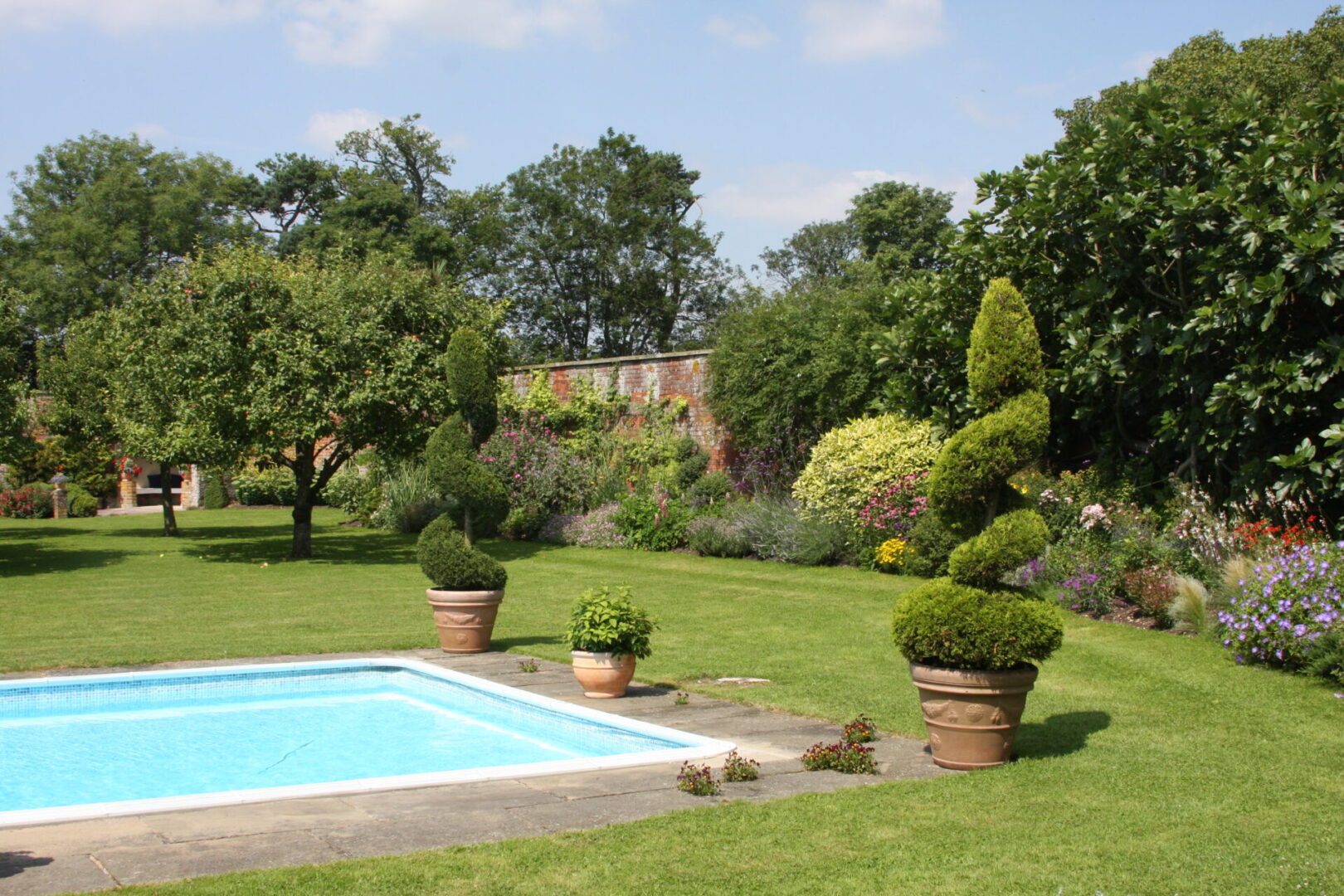 Custom Landscape Designs, Michigan Marguerite N. Decker Landscaping